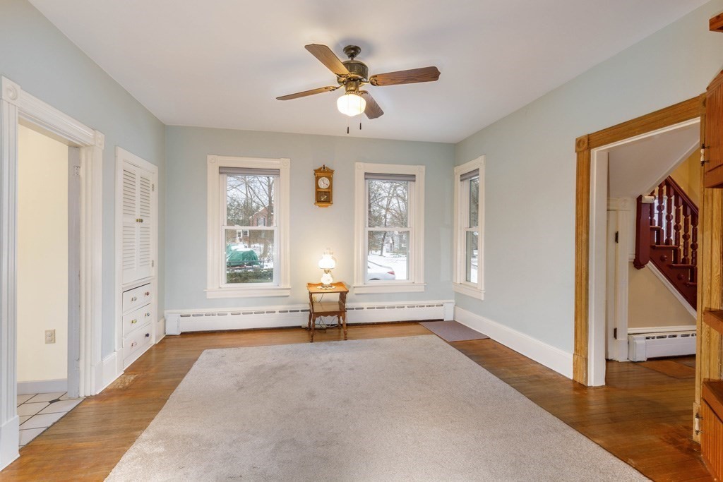 225 Wallingford Avenue Athol, MA 01331 - Photo 5 of 24 a view of livingroom with window and hardwood floor