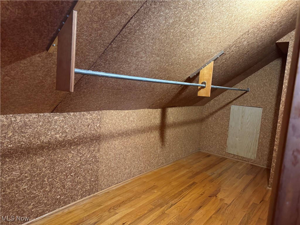 1139 Kessel Avenue Akron, OH 44310 - Photo 19 of 36 Walk in closet featuring wood finished floors