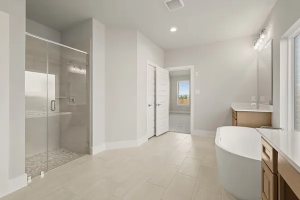 a bathroom with a sink and mirror