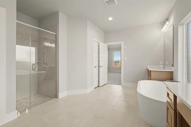 a bathroom with a sink and mirror