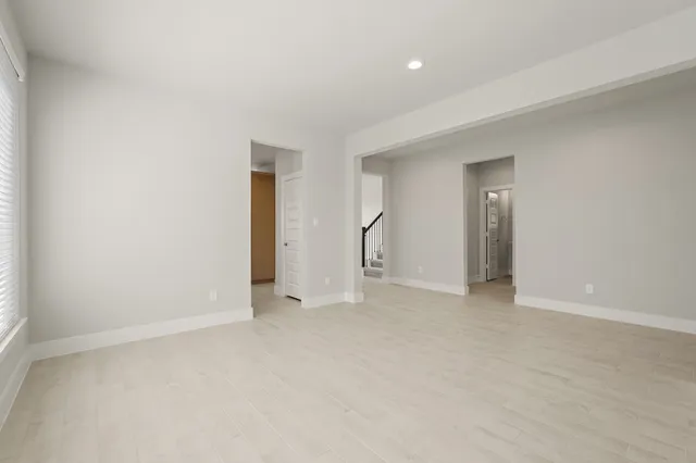 an empty room with an entryway