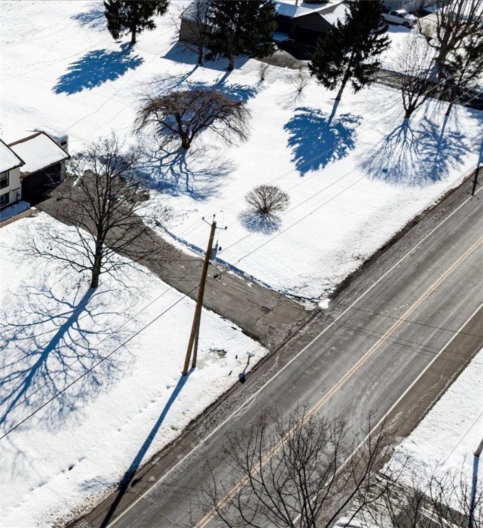 400 East Manitou Road Greece, NY 14468 - Photo 2 of 2 homes on either side and "forever" wild to the rea