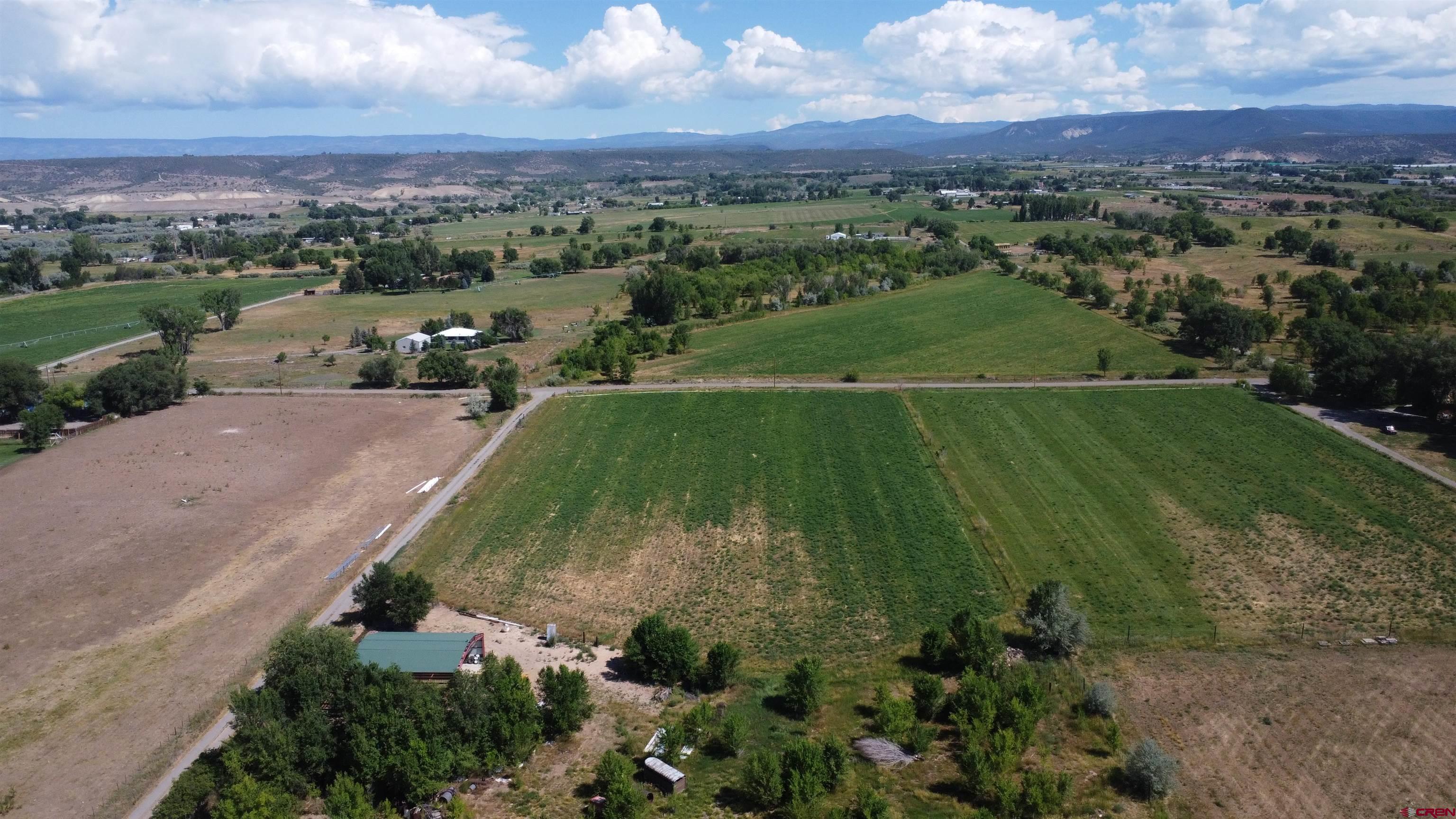 No Address No Address J Road Hotchkiss, CO 81419 - Photo 11 of 17 an aerial view of a houses with a yard