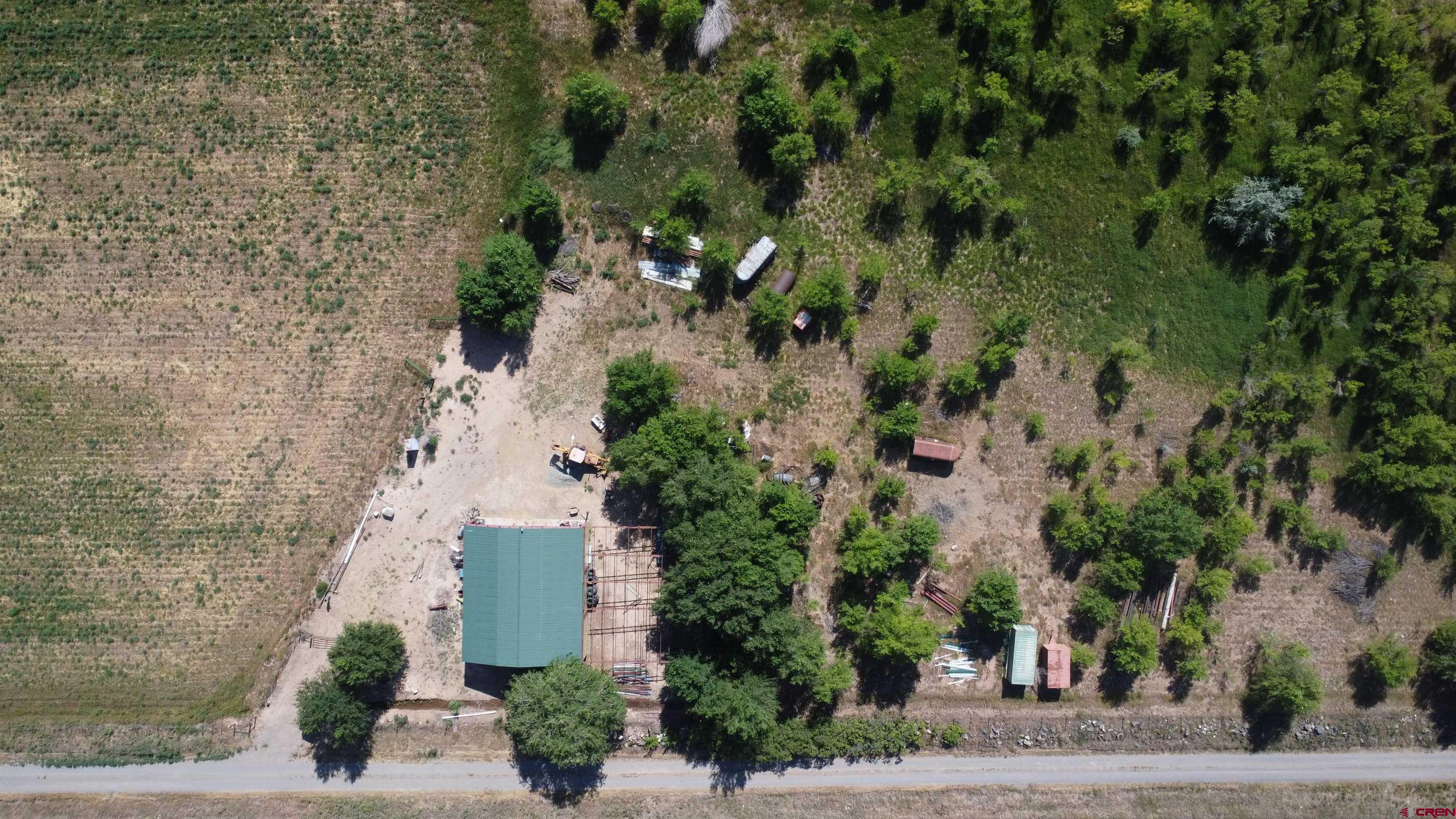 No Address No Address J Road Hotchkiss, CO 81419 - Photo 12 of 17 an aerial view of a house with a yard and large tree