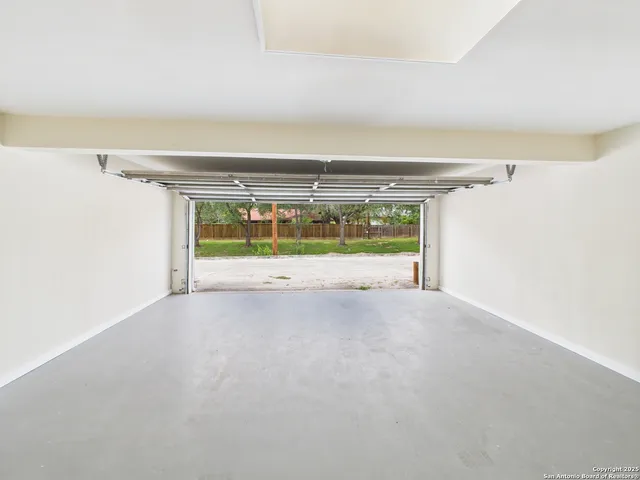 a view of room and an empty room