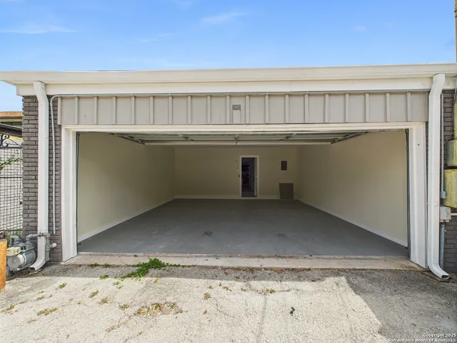 a view of a kitchen with a sink