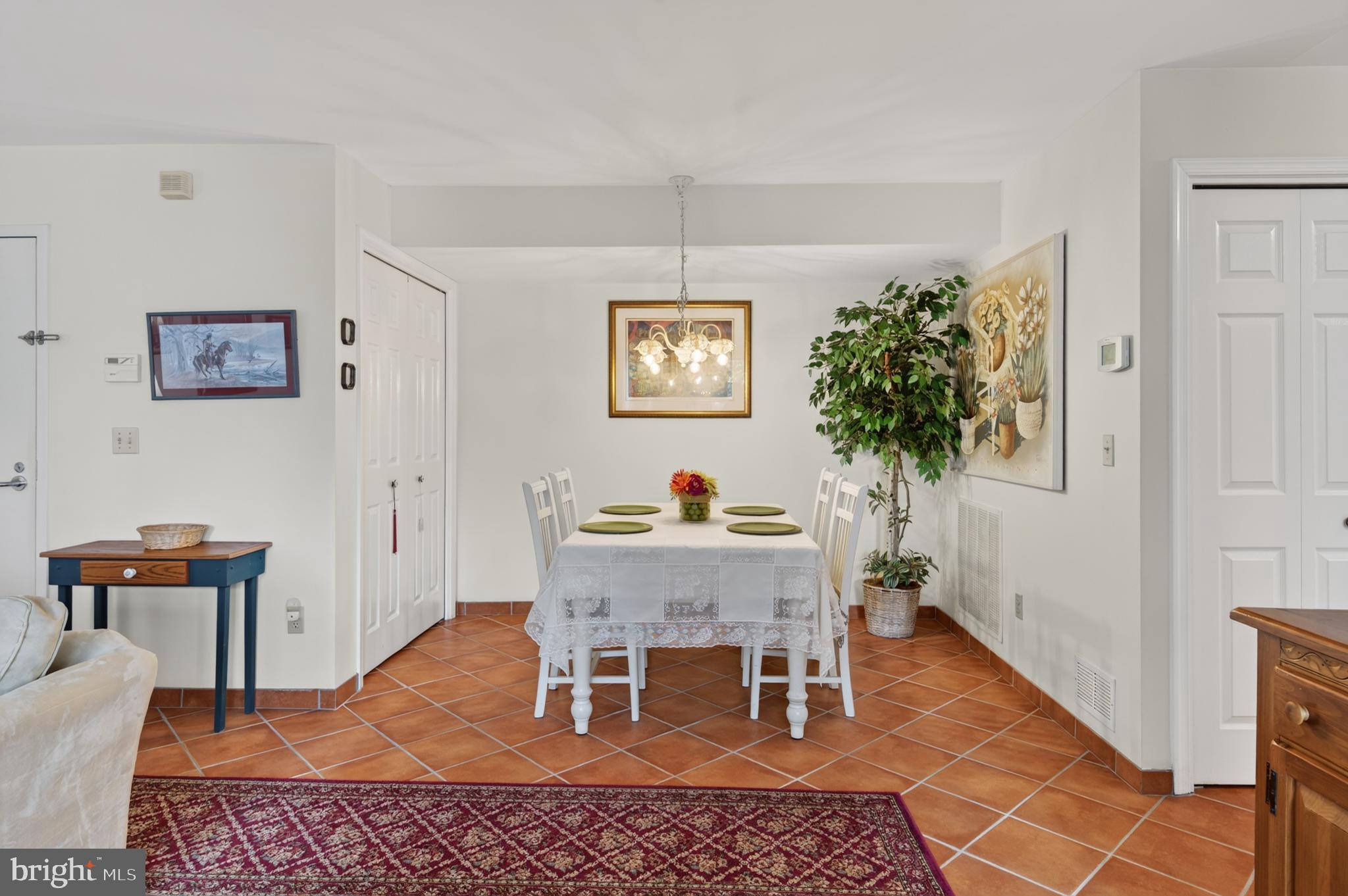 936 Bay Ridge Avenue, Unit 201 Annapolis, MD 21403 - Photo 11 of 40 a view of a dining room with furniture