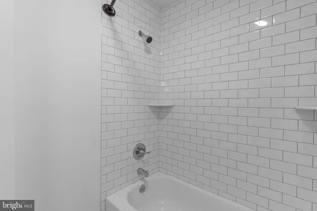 a bathroom with a bathtub