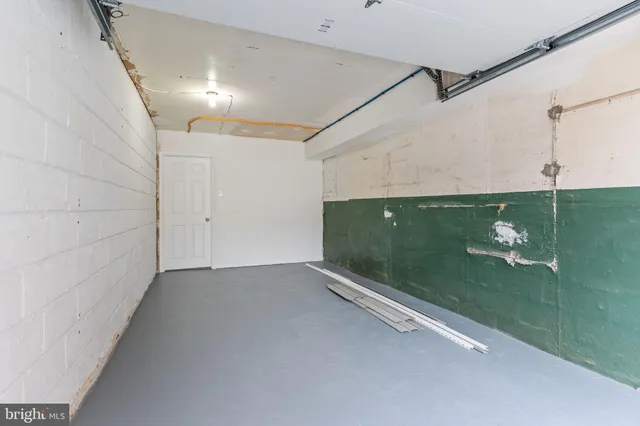 a view of an empty room with a balcony