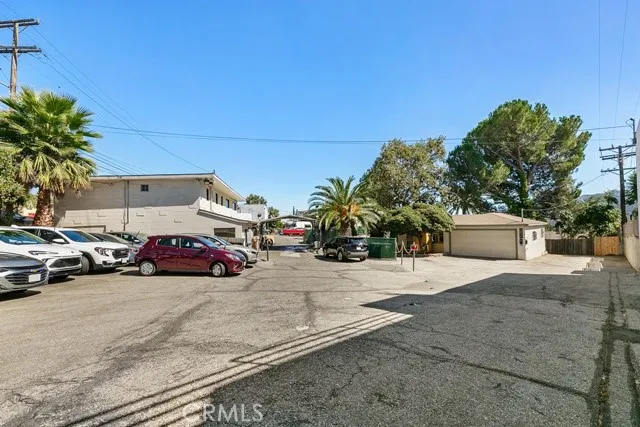 a view of a cars parked in front of a house