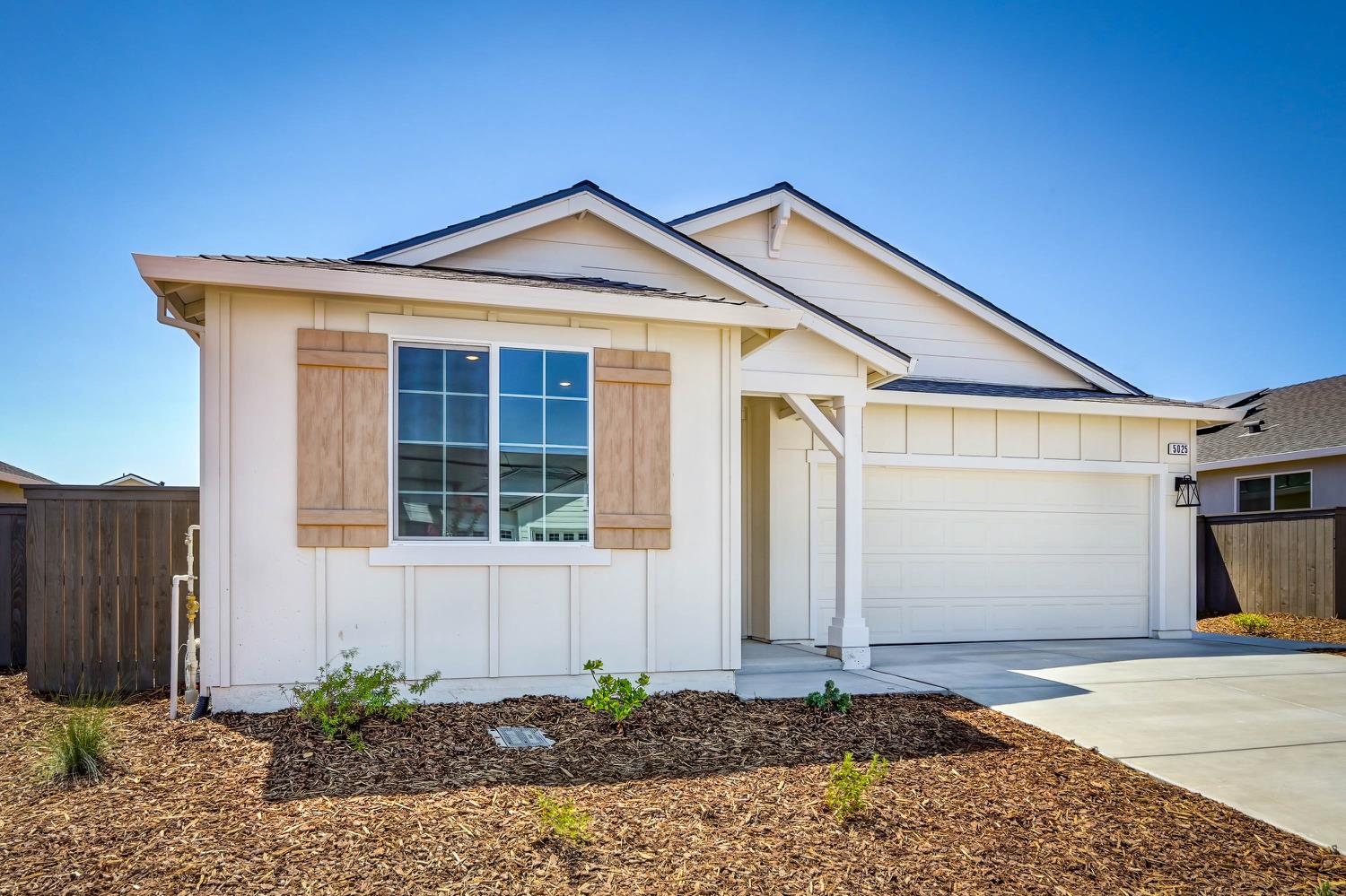 5025 Rialto Drive Roseville, CA 95747 - Photo 1 of 1 a front view of a house with garden