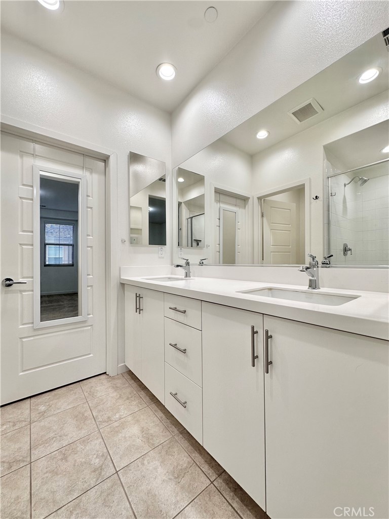 21042 Cornerstone Drive Walnut, CA 91789 - Photo 16 of 29 a spacious bathroom with a double vanity sink mirror and