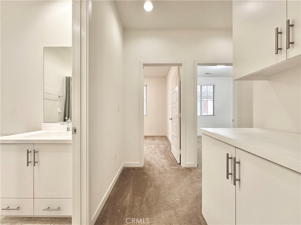 21042 Cornerstone Drive Walnut, CA 91789 - Photo 24 of 29 a bathroom with a sink and a mirror