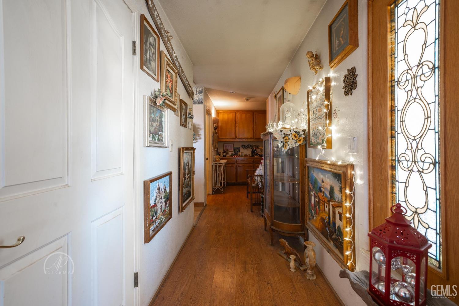 Undisclosed Address Taft, CA 93268 - Photo 11 of 38 a view of a hallway with windows
