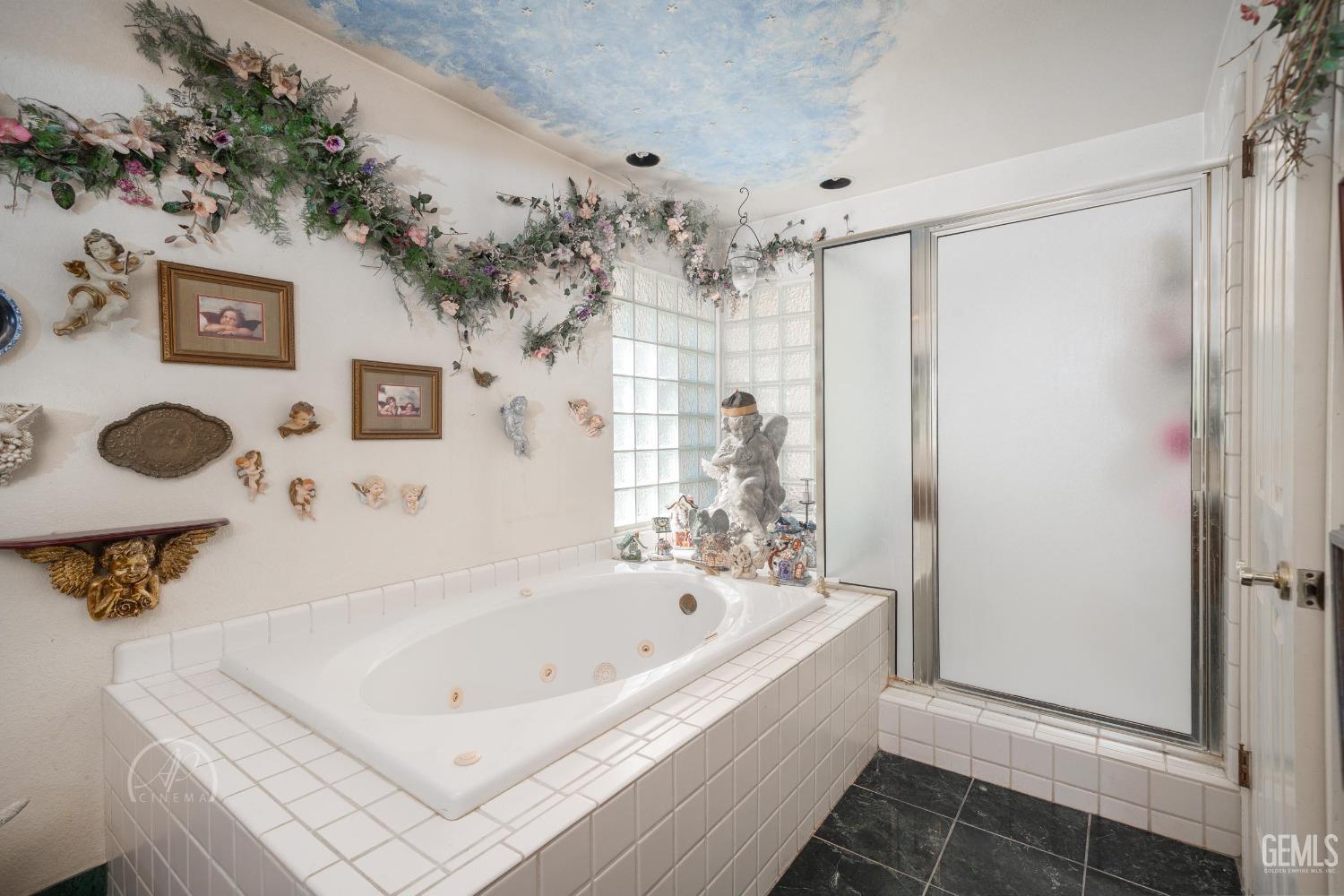 Undisclosed Address Taft, CA 93268 - Photo 16 of 38 a bathroom with a bathtub and shower