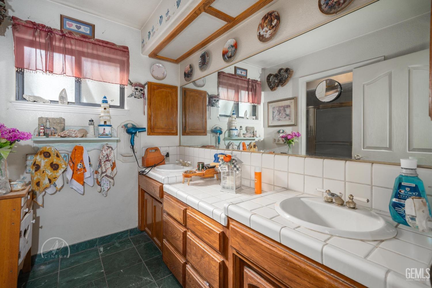 Undisclosed Address Taft, CA 93268 - Photo 18 of 38 a kitchen with stainless steel appliances granite countertop a sink and cabinets