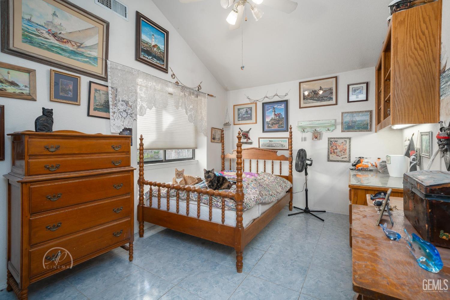 Undisclosed Address Taft, CA 93268 - Photo 20 of 38 a bedroom with furniture and a baby crib