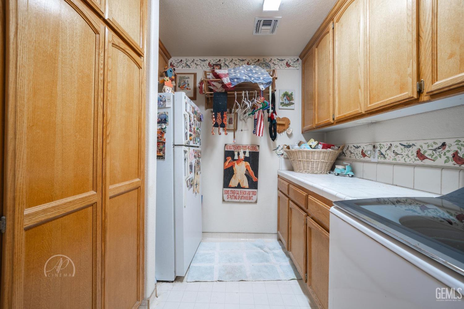 Undisclosed Address Taft, CA 93268 - Photo 25 of 38 a view of storage and utility room