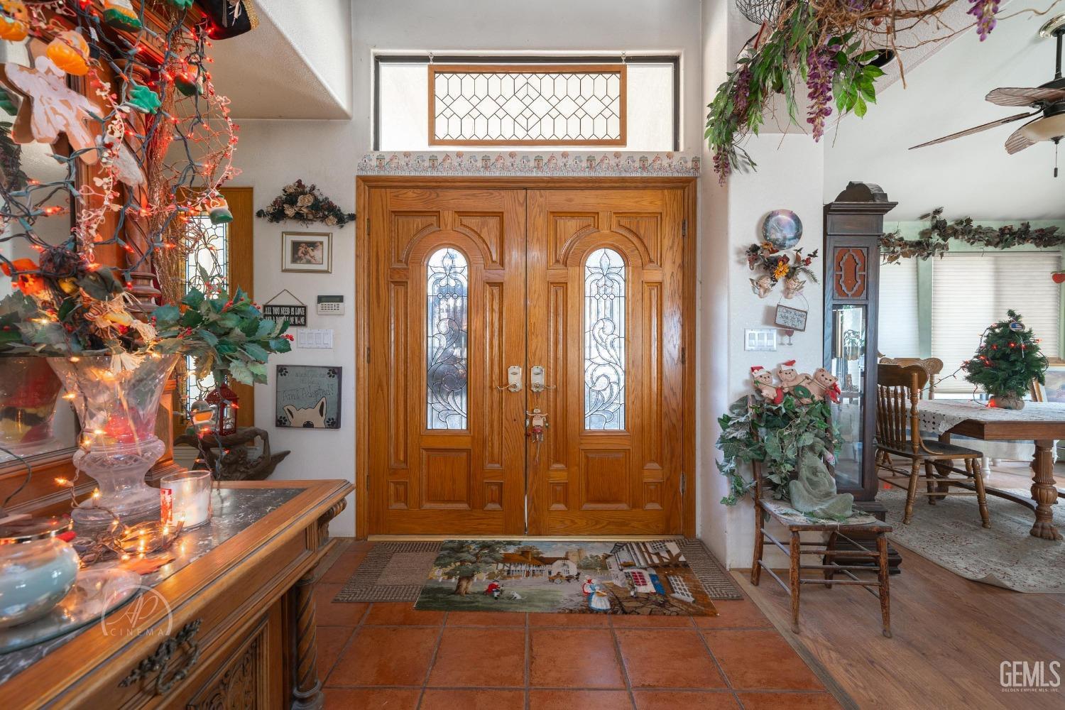 Undisclosed Address Taft, CA 93268 - Photo 5 of 38 a room with furniture and a potted plant