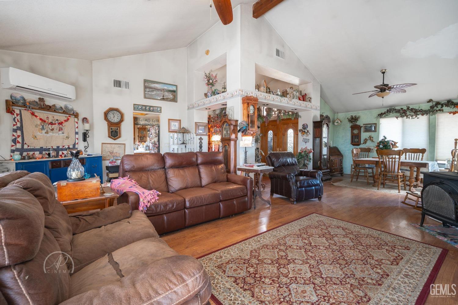 Undisclosed Address Taft, CA 93268 - Photo 7 of 38 a living room with furniture a rug and kitchen view