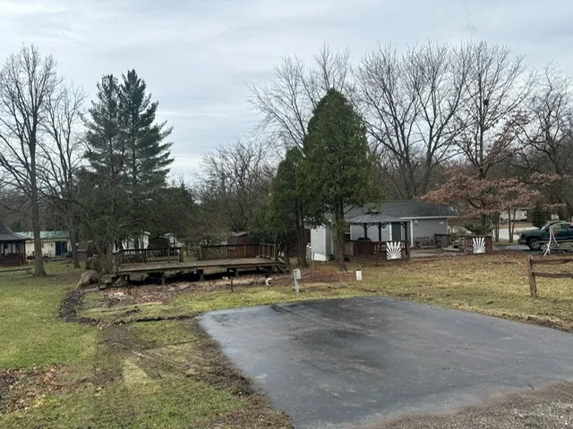 a swimming pool view with a outdoor seating