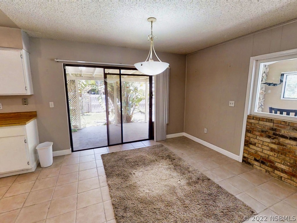 401 East Citrus Street Altamonte Springs, FL 32701 - Photo 15 of 36 a view of a room with wooden floor and windows