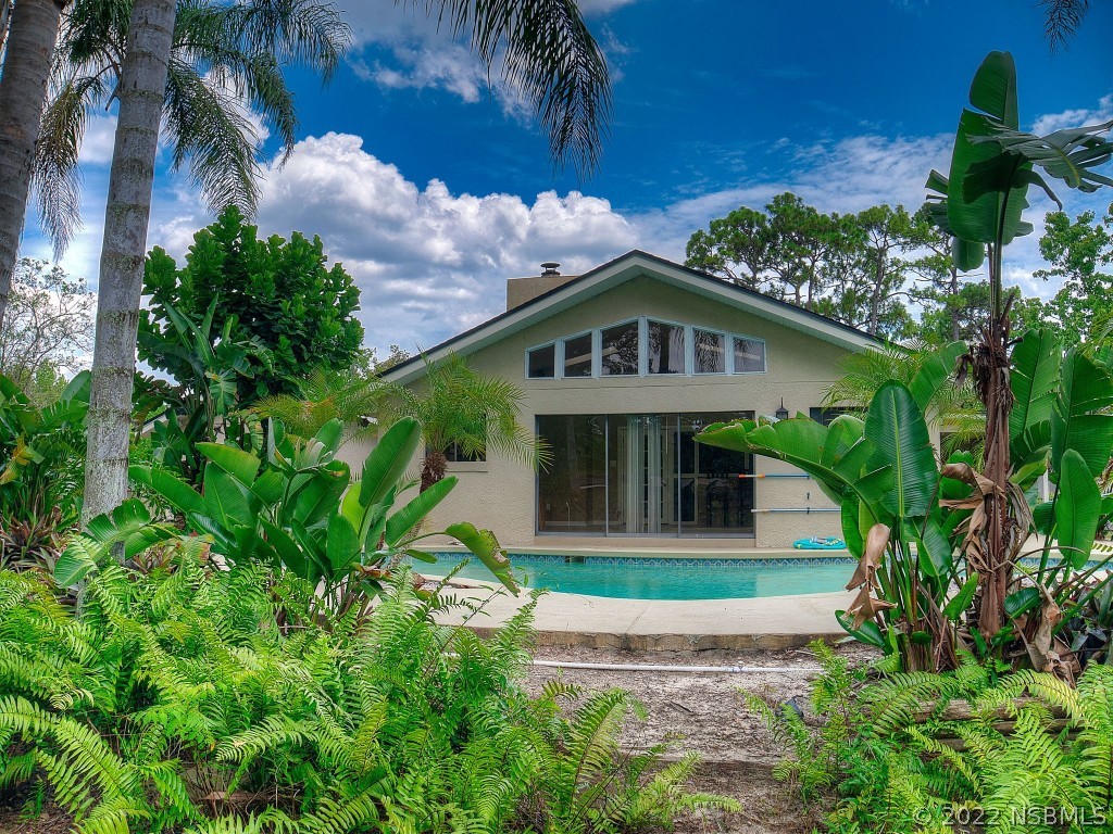 401 East Citrus Street Altamonte Springs, FL 32701 - Photo 3 of 36 a front view of a house with a yard