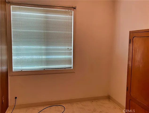 a view of a room that has a window in it