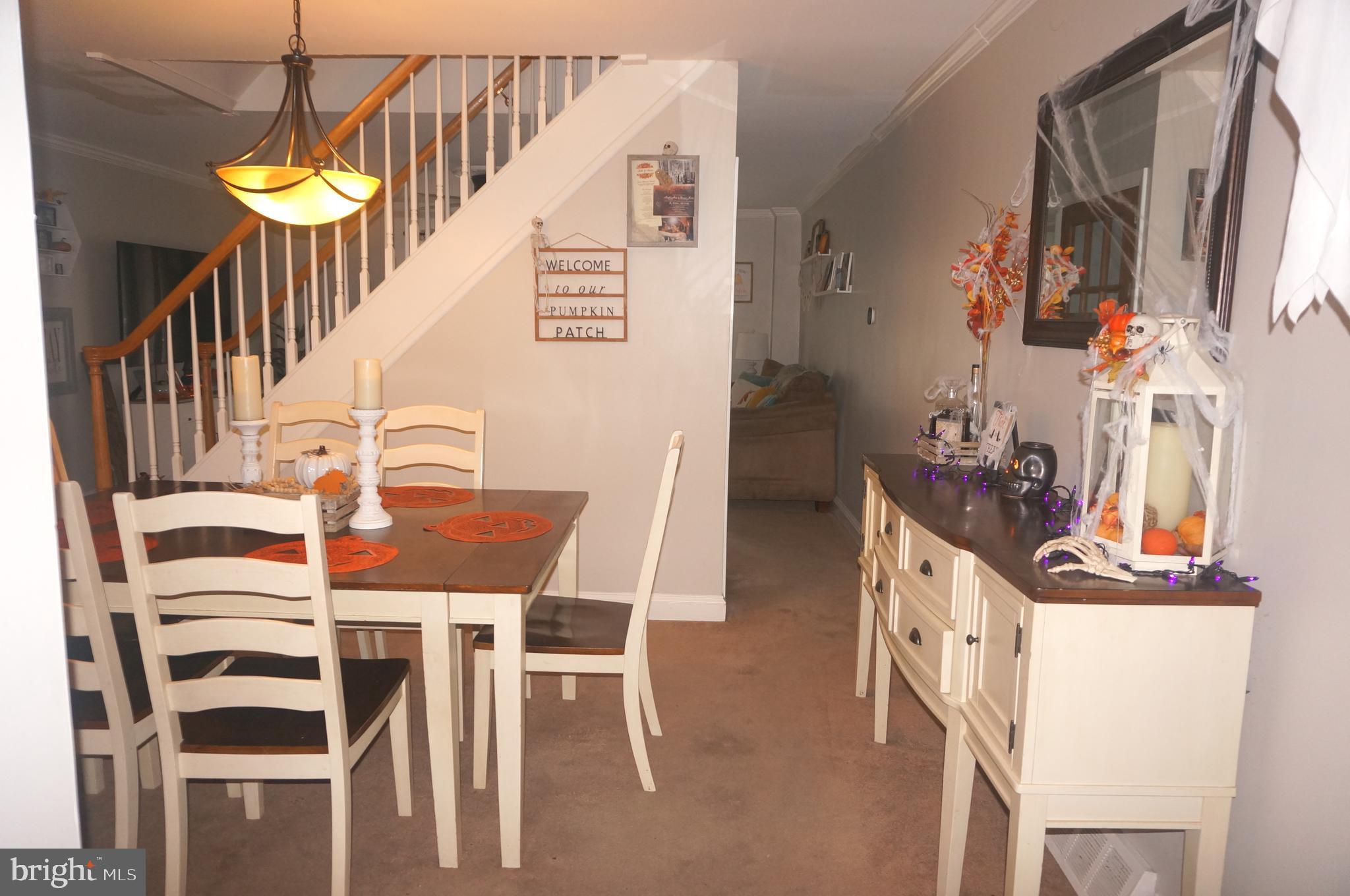 3599 C Nottingham Lane Philadelphia, PA 19114 - Photo 16 of 58 a view of a dining room with furniture and wooden floor