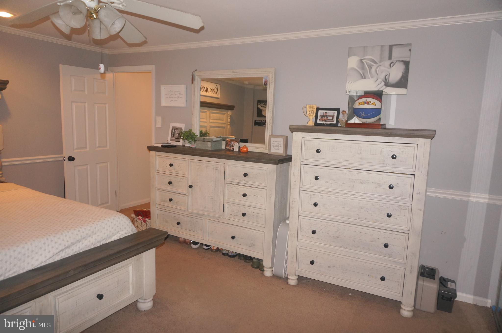 3599 C Nottingham Lane Philadelphia, PA 19114 - Photo 29 of 58 a bedroom with a bed and a dresser