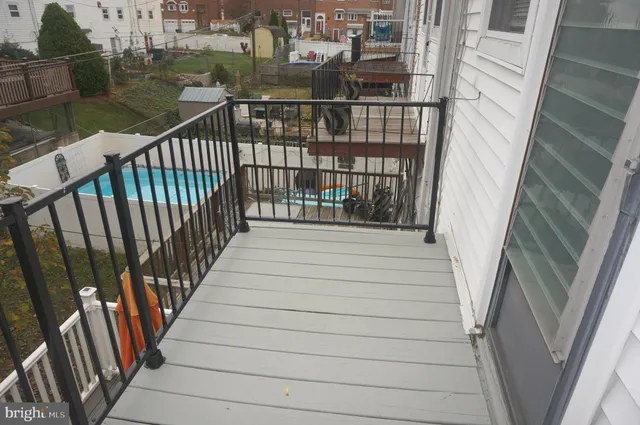 a view of backyard with a small cabin