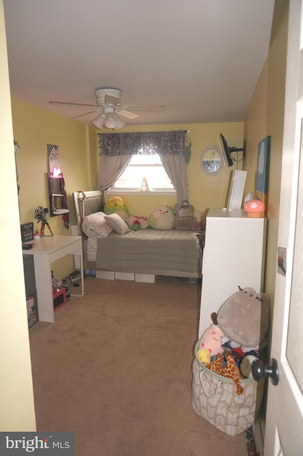 3599 C Nottingham Lane Philadelphia, PA 19114 - Photo 35 of 58 a living room with furniture and a chandelier