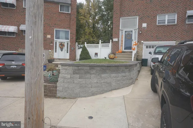 a view of a street with cars