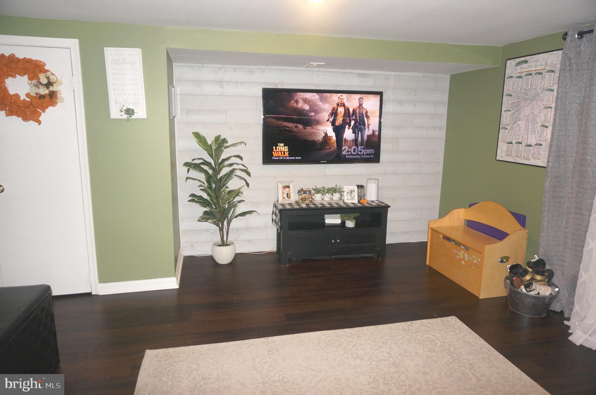 3599 C Nottingham Lane Philadelphia, PA 19114 - Photo 44 of 58 a living room with furniture and a flat screen tv