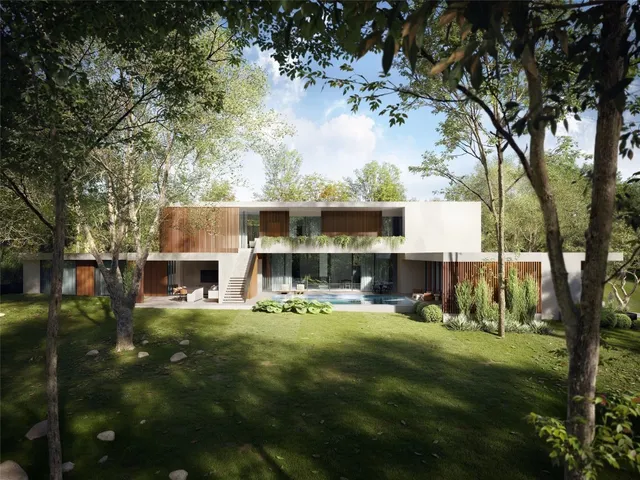 a view of a house with backyard porch and sitting area
