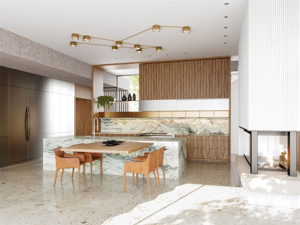 2 Martelli Lane Austin, TX 78746 - Photo 3 of 15 a kitchen with stainless steel appliances kitchen island granite countertop a table and chairs in it