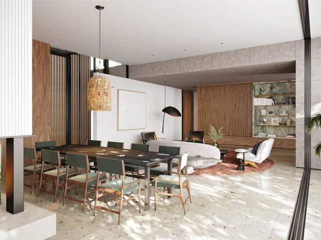 a living room with lots of chairs and a table