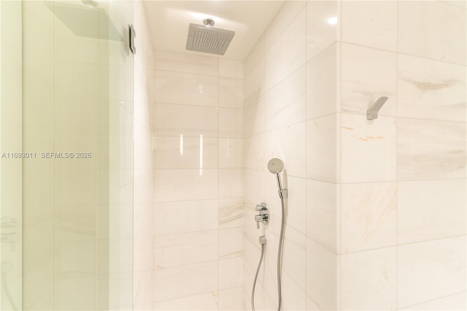 300 Biscayne Blvd Way, Unit 2103 Miami, FL 33131 - Photo 26 of 41 a bathroom with a shower