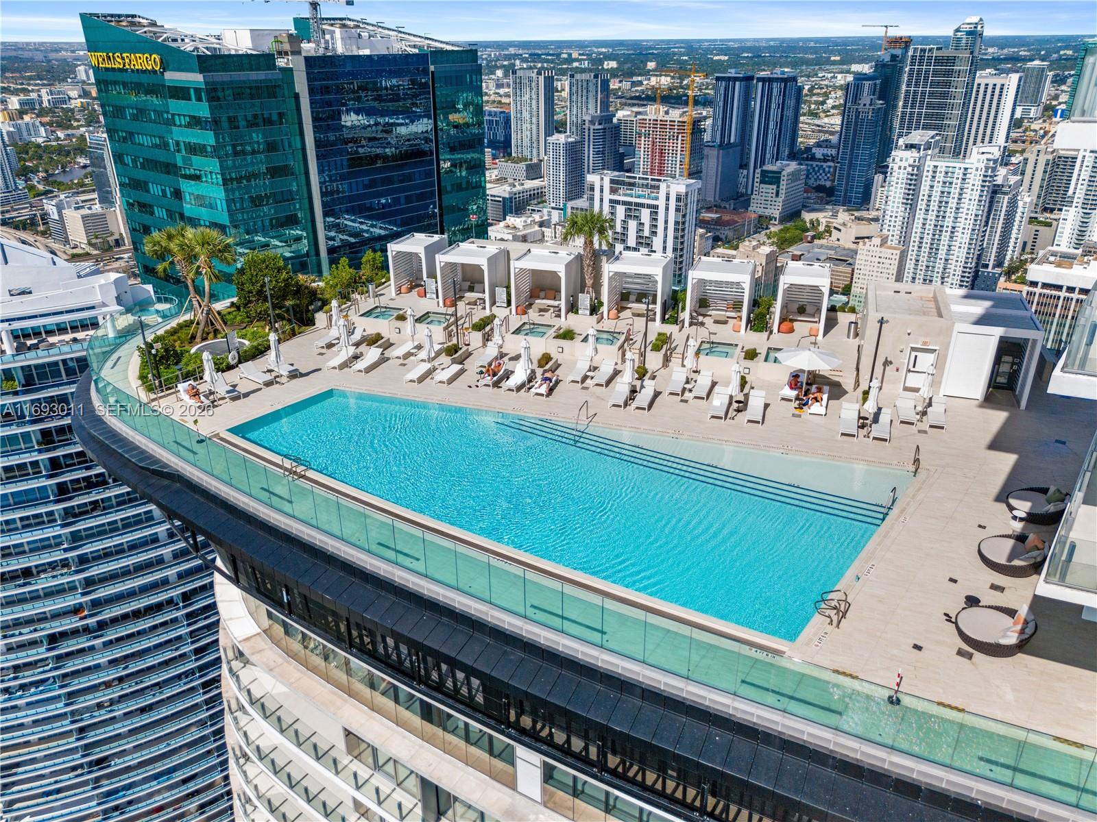 300 Biscayne Blvd Way, Unit 2103 Miami, FL 33131 - Photo 5 of 41 a view of a balcony with chairs