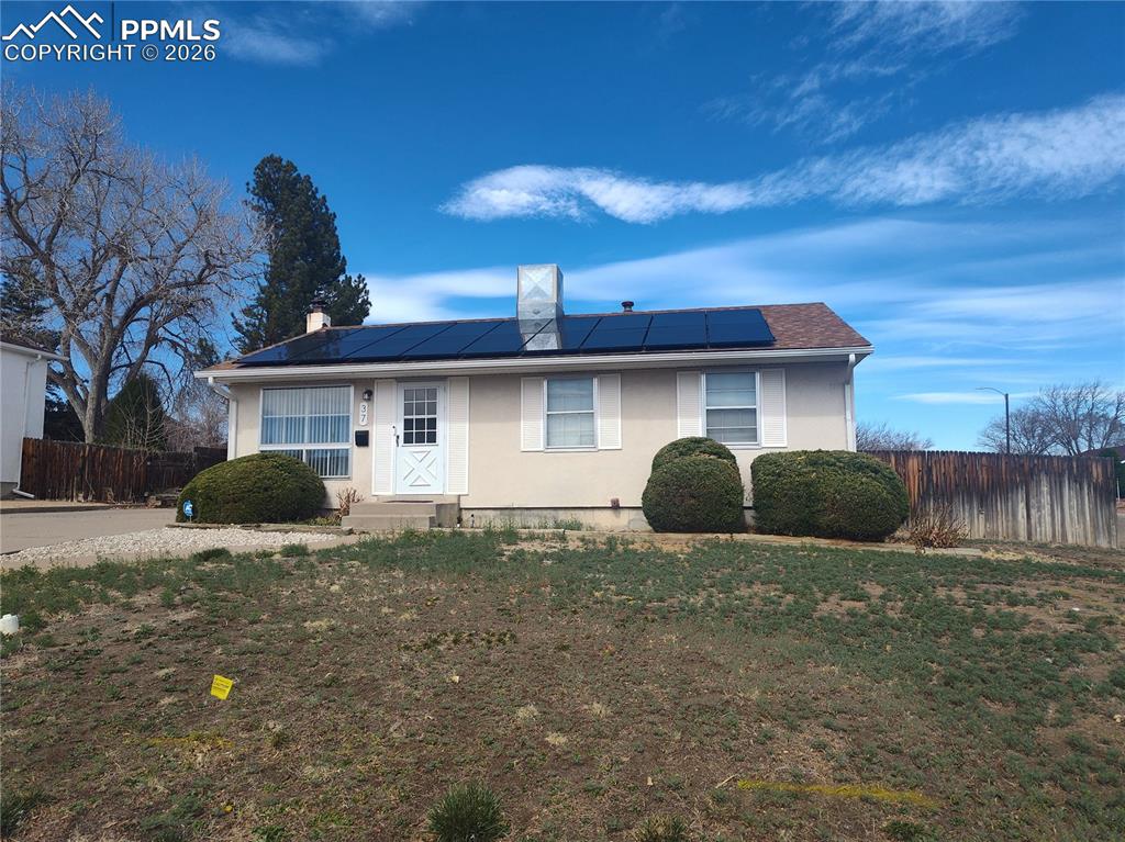 37 Massari Road Pueblo, CO 81001 - Photo 2 of 37 a front view of a house with garden