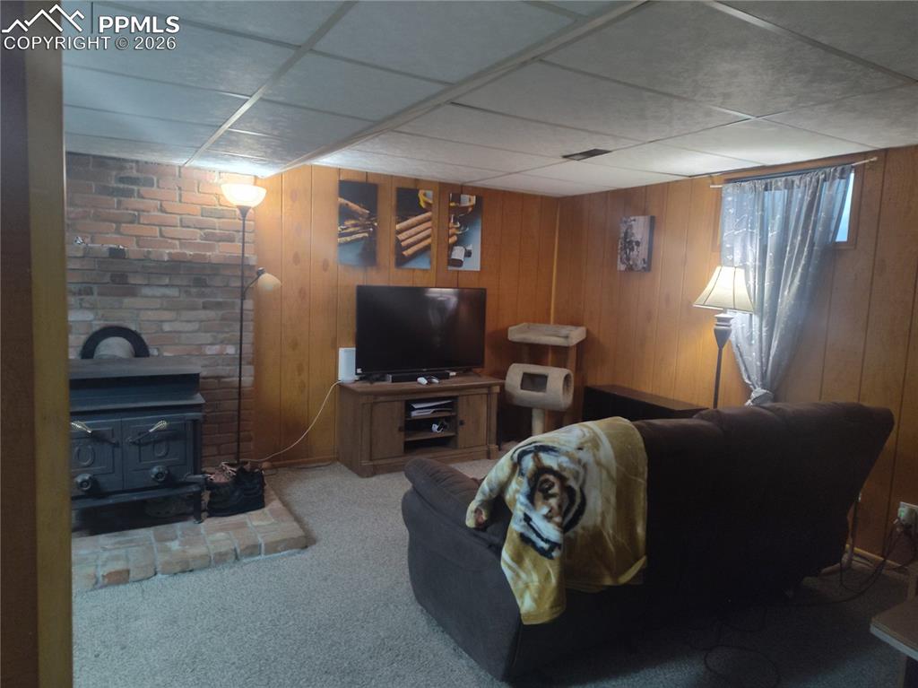 37 Massari Road Pueblo, CO 81001 - Photo 22 of 37 a living room with furniture and a flat screen tv