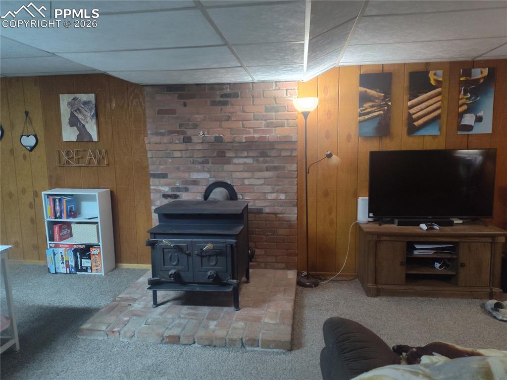 37 Massari Road Pueblo, CO 81001 - Photo 23 of 37 a living room with furniture and a flat screen tv