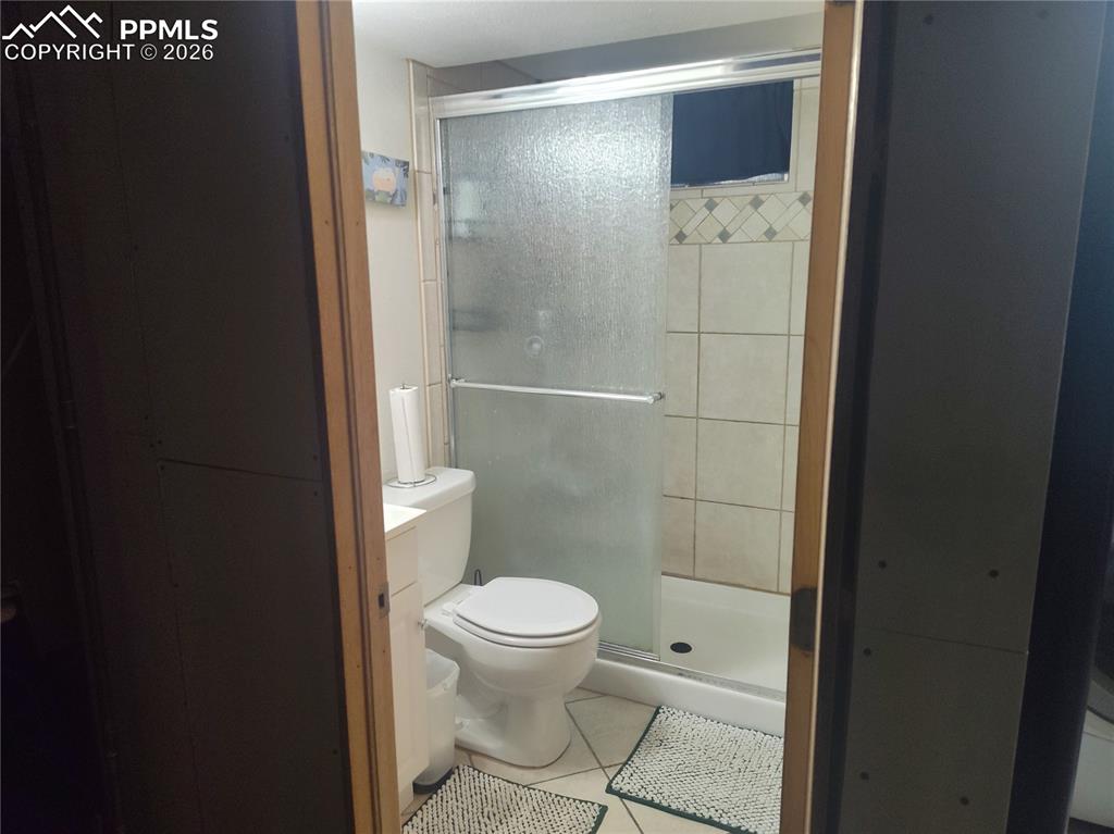 37 Massari Road Pueblo, CO 81001 - Photo 27 of 37 a bathroom with a toilet and a shower