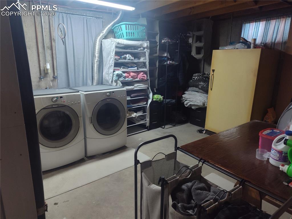 37 Massari Road Pueblo, CO 81001 - Photo 28 of 37 a utility room with dryer and washer