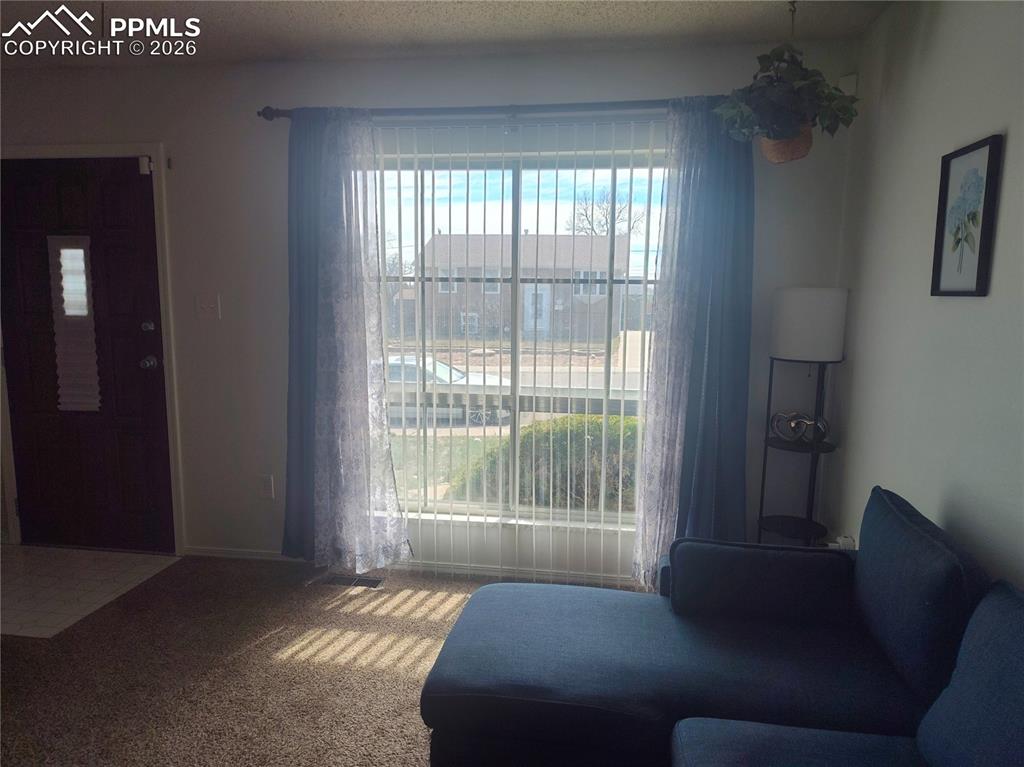 37 Massari Road Pueblo, CO 81001 - Photo 3 of 37 a bed sitting in a bedroom next to a window