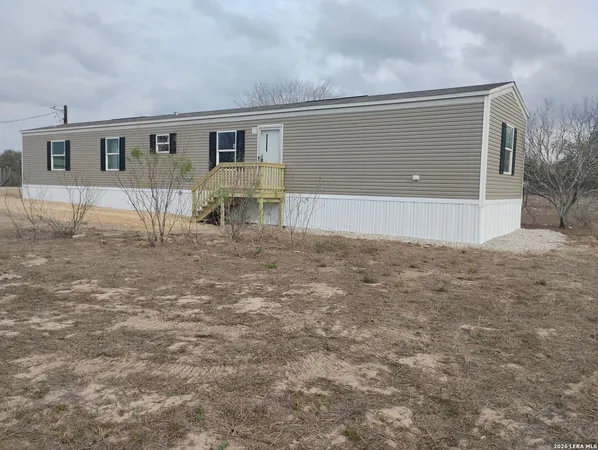 a view of backyard of house