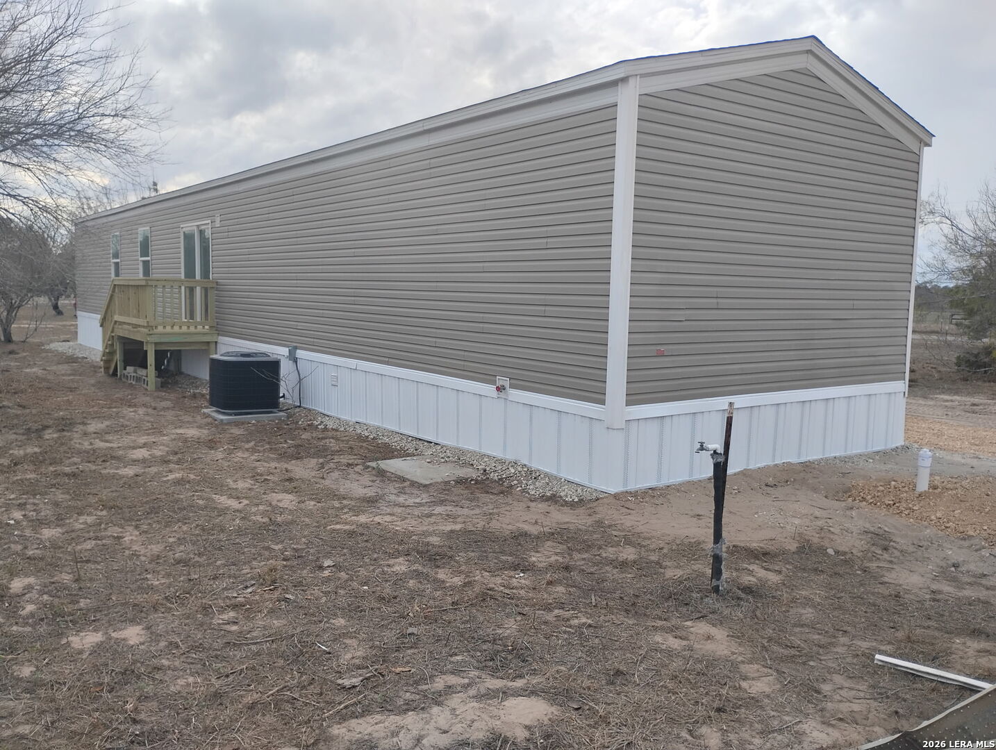 1390 Rendon Road Poteet, TX 78065 - Photo 22 of 22 a view of a backyard