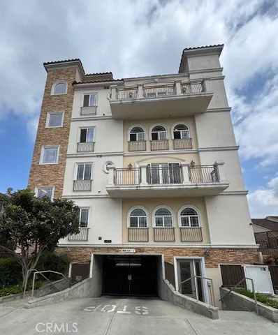 a front view of a building with balcony
