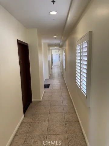 a living room with fireplace furniture and a flat screen tv