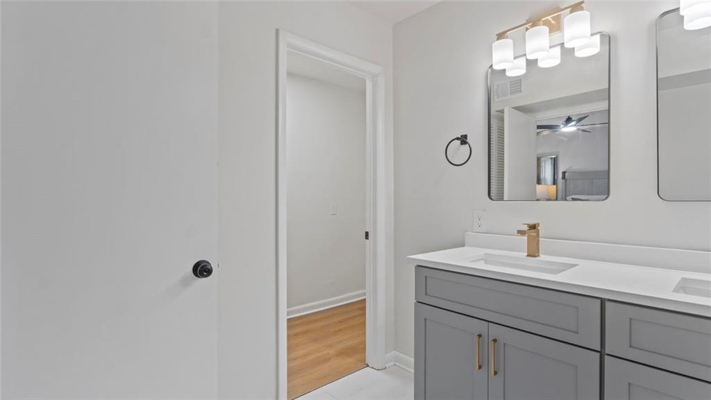 4088 Vale Court Decatur, GA 30035 - Photo 13 of 30 a bathroom with a sink and a mirror
